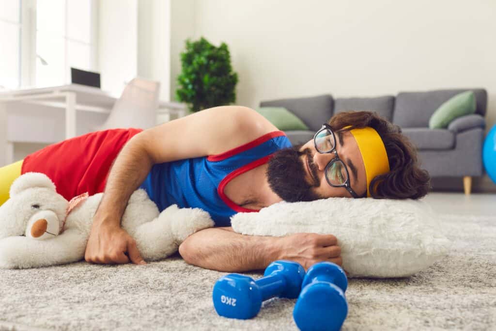 Man takes a rest during a workout at home.